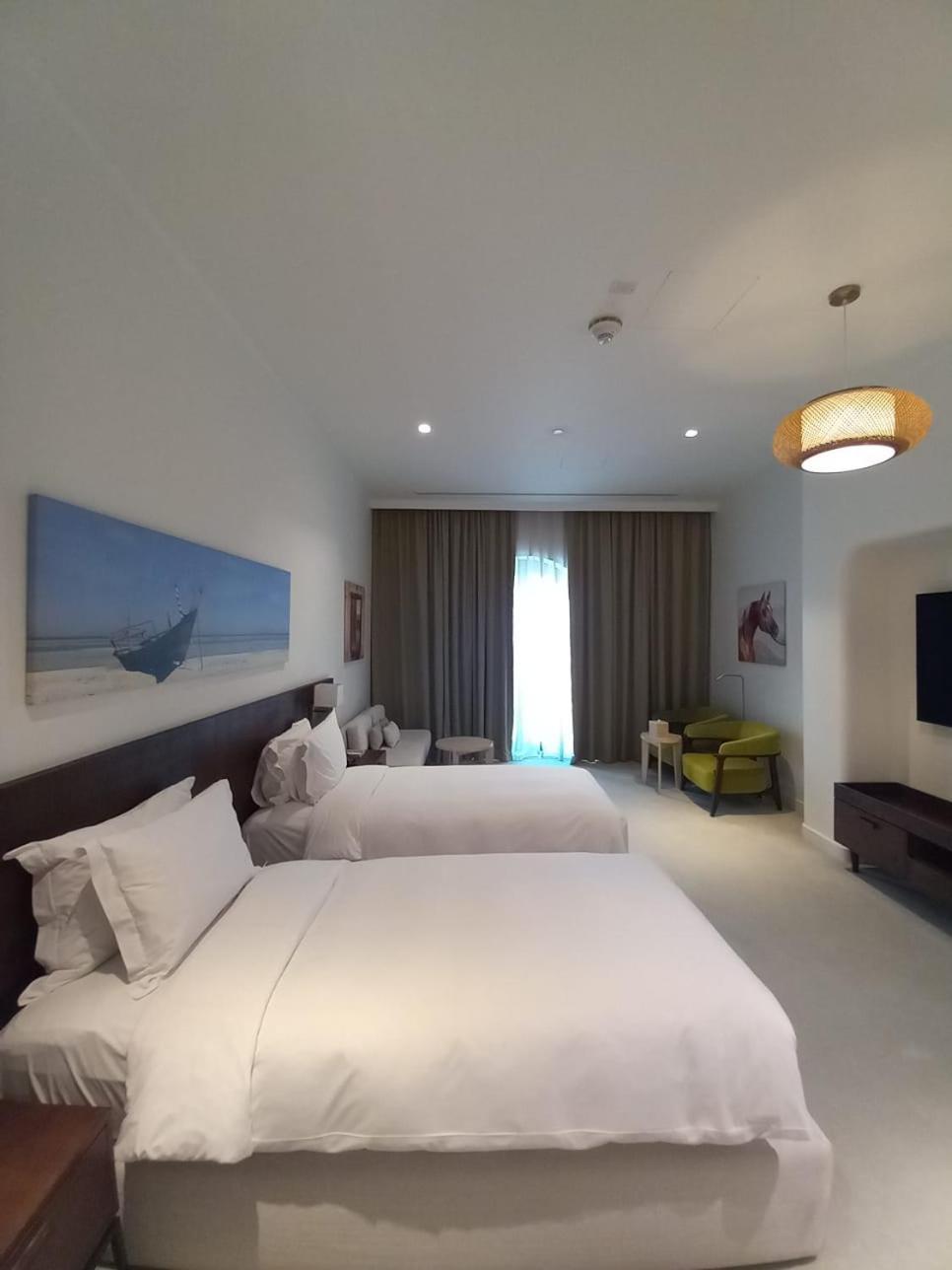 Mina Hotel And Residences By The Torch 多哈 外观 照片 A room at the hotel