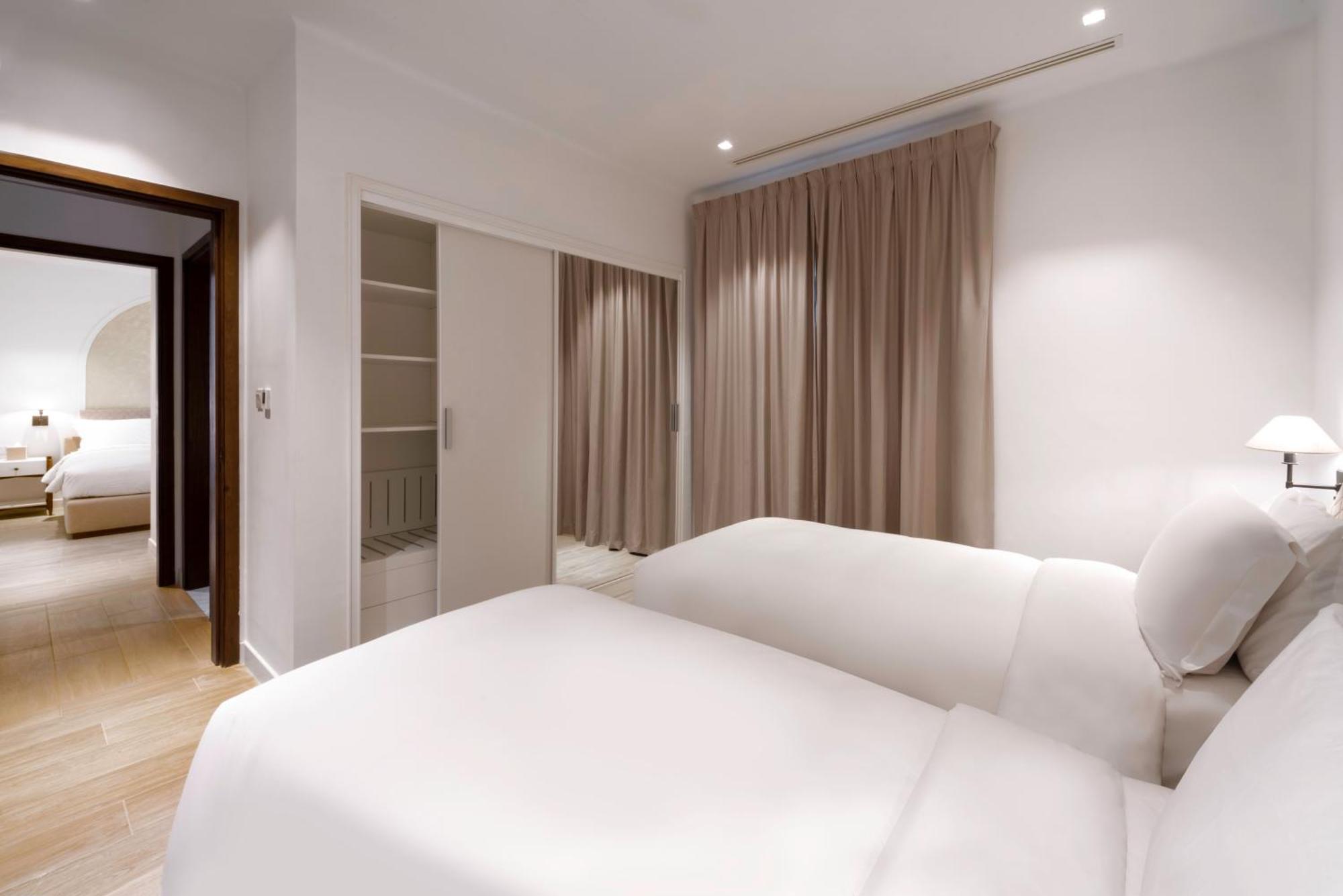 Mina Hotel And Residences By The Torch 多哈 外观 照片 A bedroom at the hotel