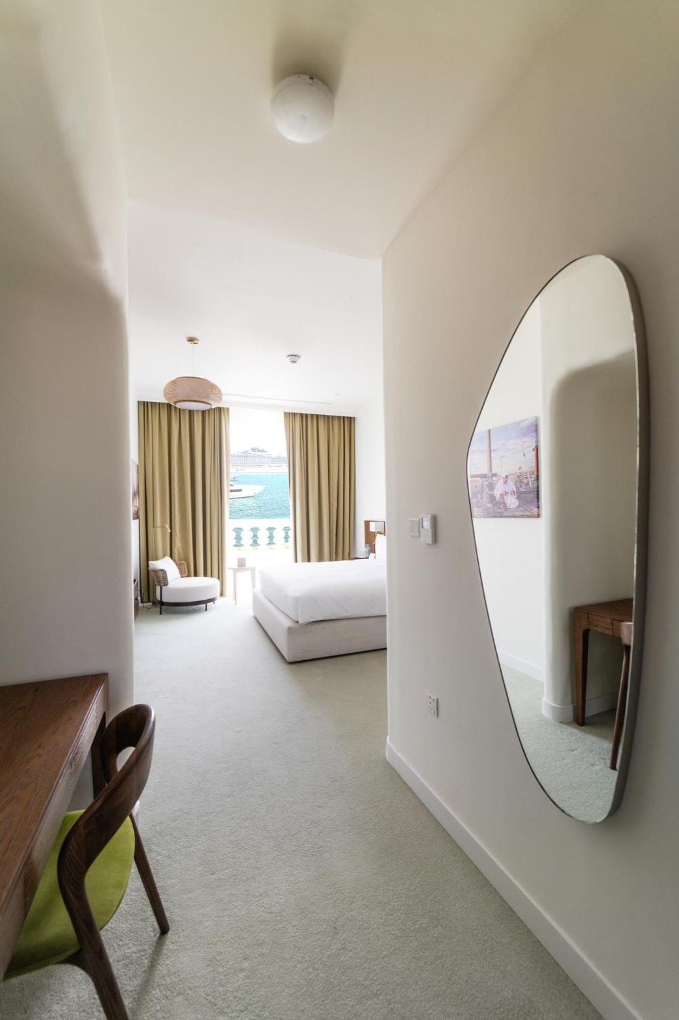 Mina Hotel And Residences By The Torch 多哈 外观 照片 A bedroom at the hotel