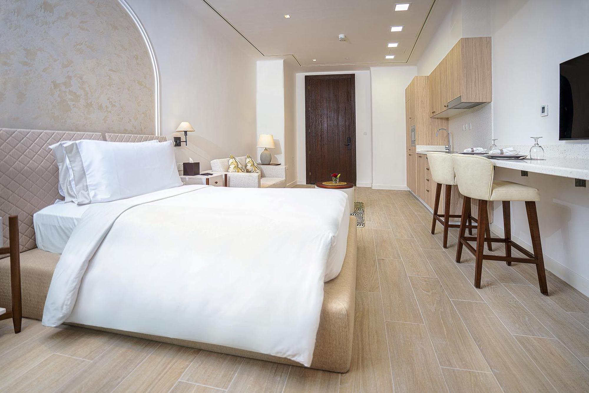 Mina Hotel And Residences By The Torch 多哈 外观 照片 A bedroom at the hotel